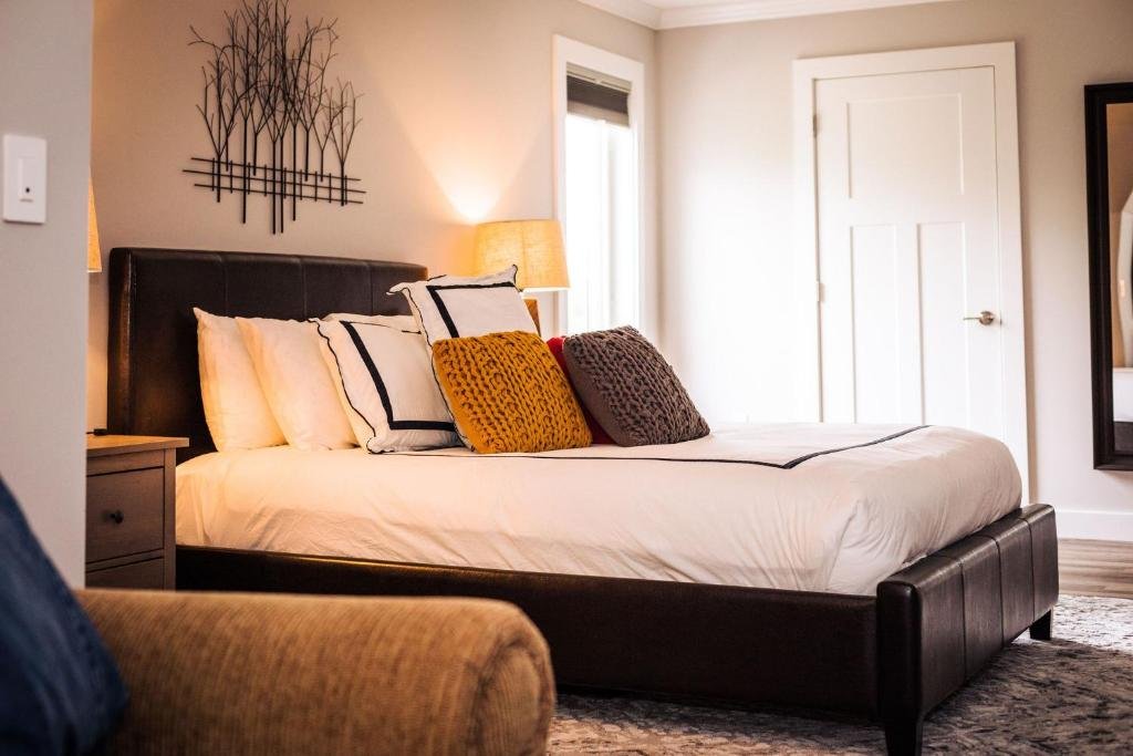 a white plate topped with a salad covered in shrimp